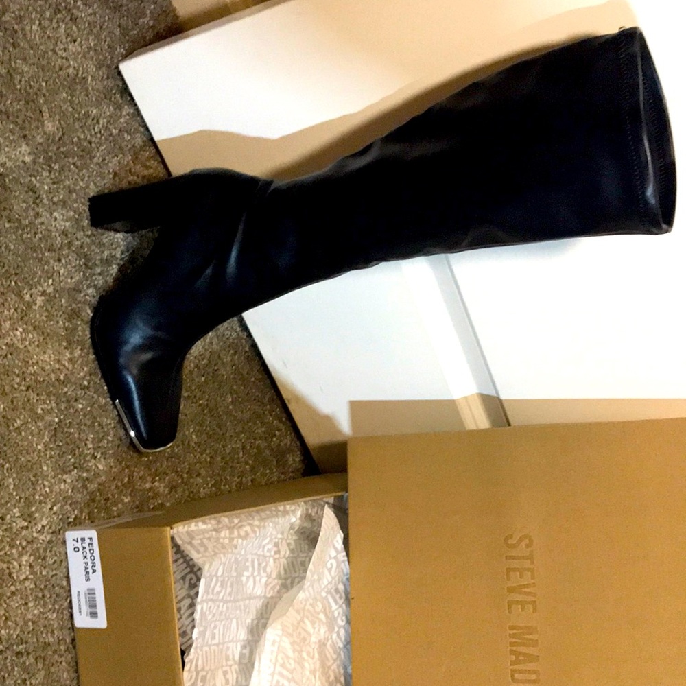 Steve Madden Black Leather boots.